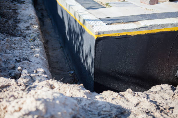 Professional Waterproofing technician working in Webster, IN